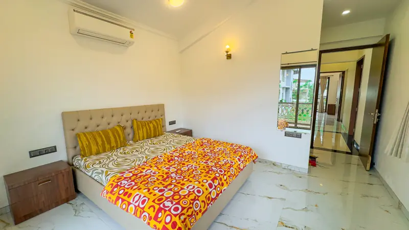 Bright bedroom with a queen bed